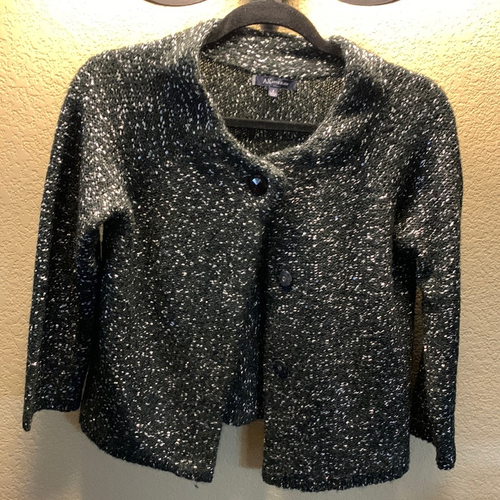 And Klein small sweater jacket. Very sparkly
